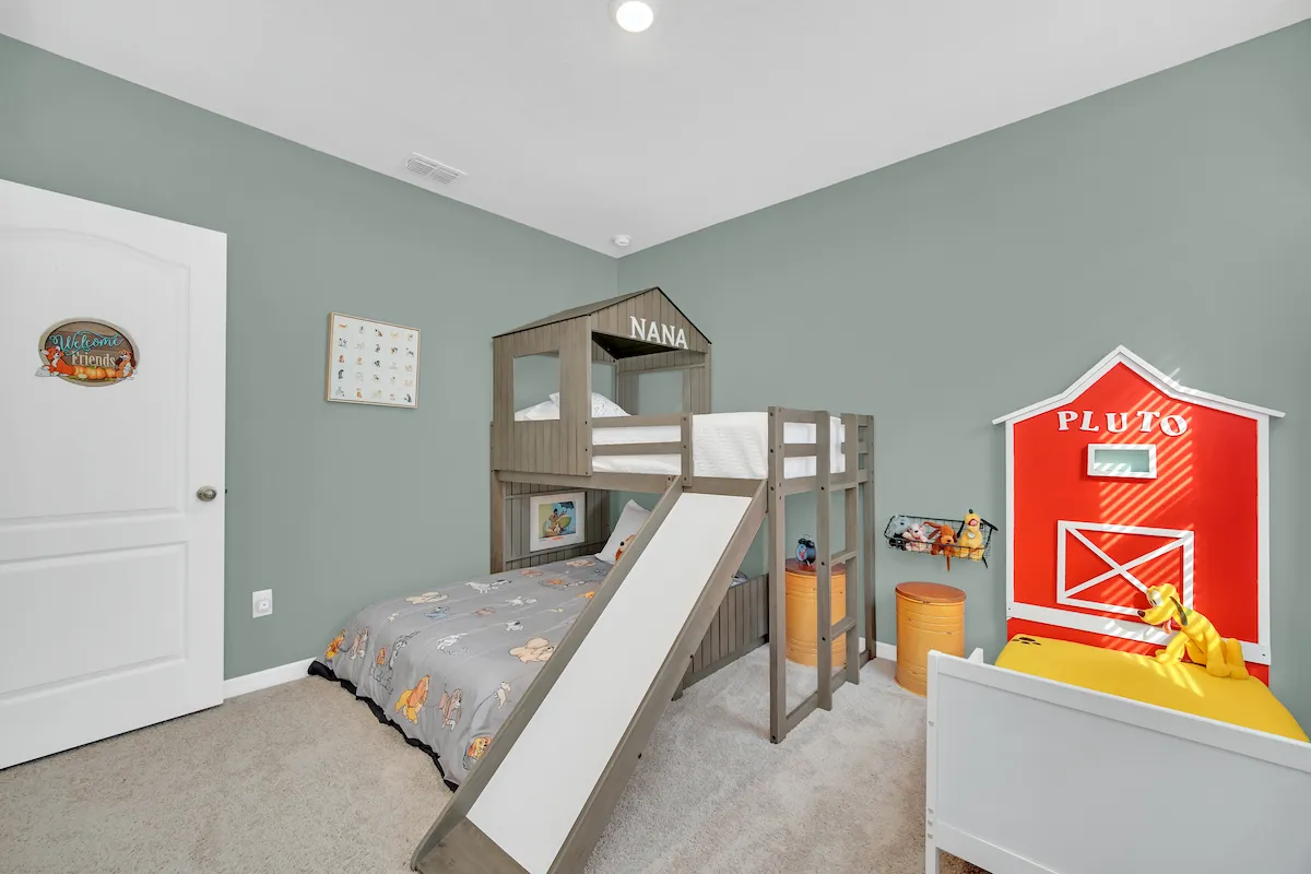 Disney Dogs room with bunk bed and toddler bed