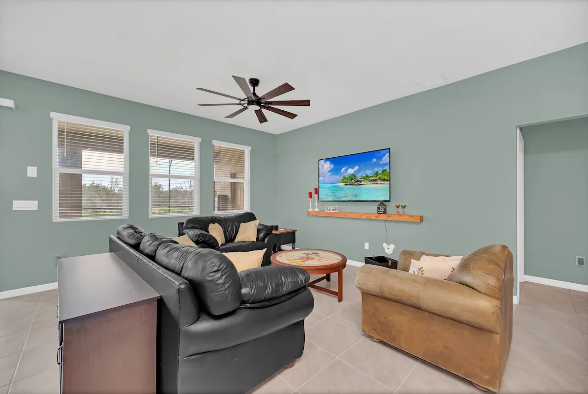 Spacious living room with mounted TV