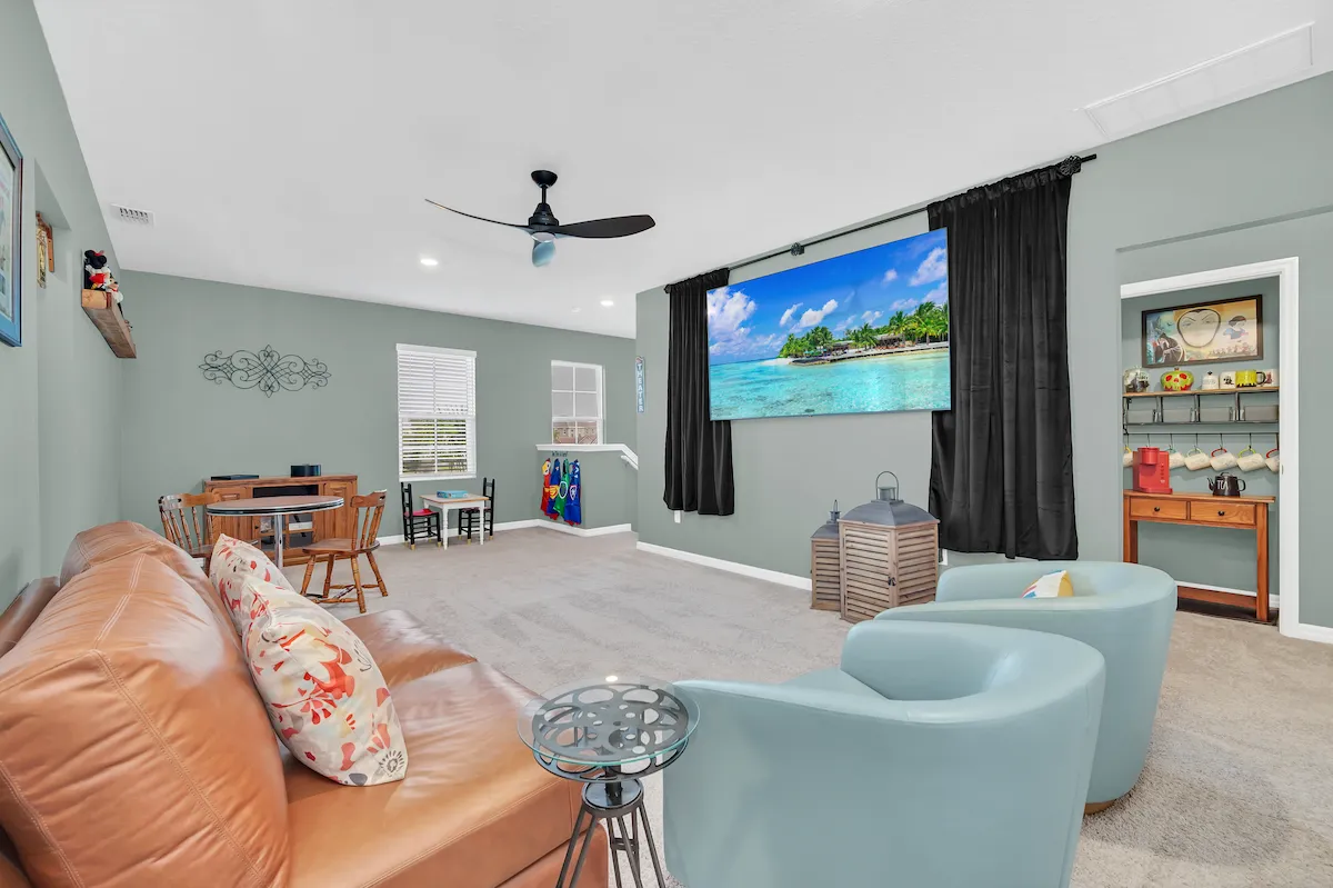 Movie loft room with 86' television